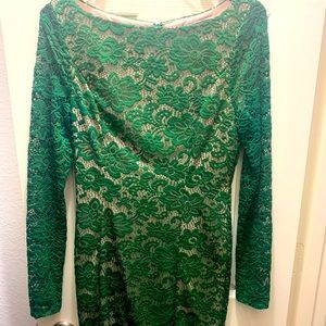 Green dress with nude underlining.